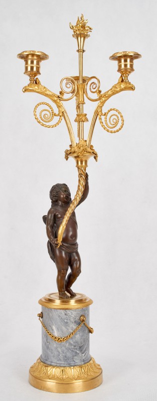 Candlestick with figure of child