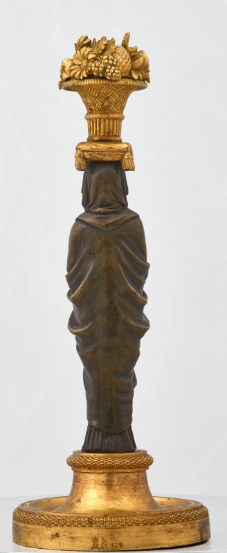Candlestick in the form of a canephor