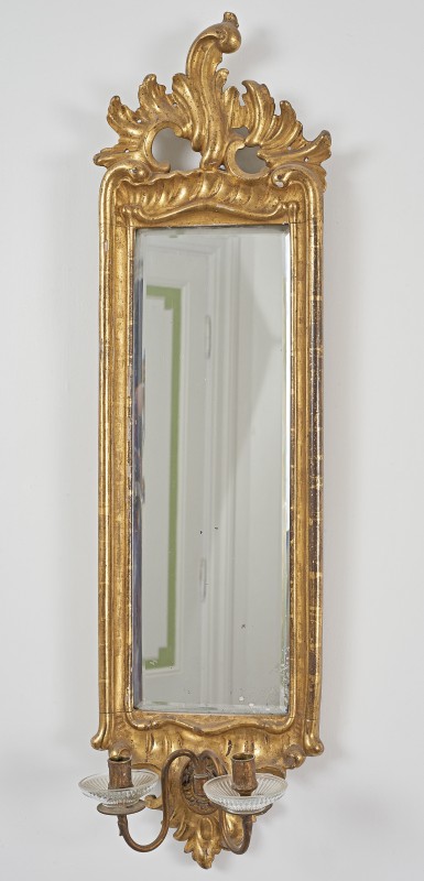 Wall sconce with mirror
