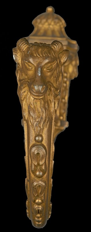 Curtain tie back with motif depicting goats’ head