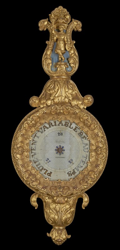 Barometer decorated with a sculpture of a falconer 