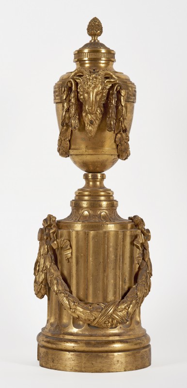 Andiron in the form of urn with head of a ram