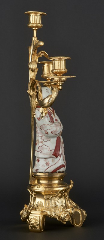 Three-branch candelabra with porcelain figurine of Japanese man