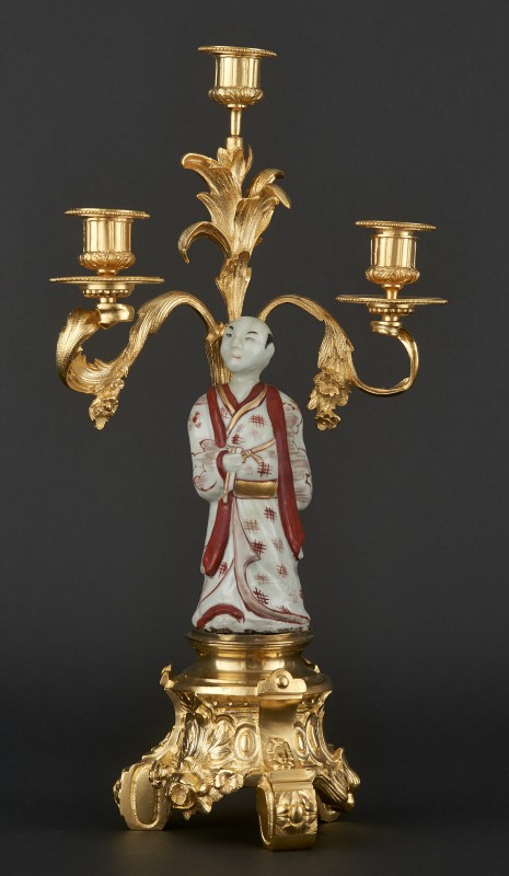 Three-branch candelabra with porcelain figurine of Japanese man