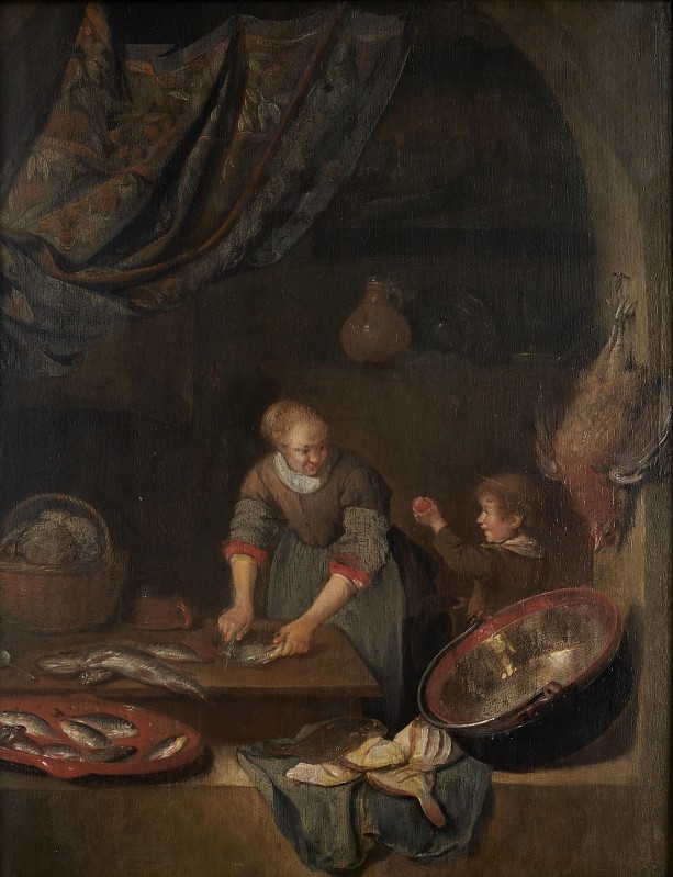 Kobieta z dzieckiem oprawiająca ryby