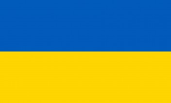 Ukraińska flaga w kolorach niebieskim na górze, a żółtym na dole. 