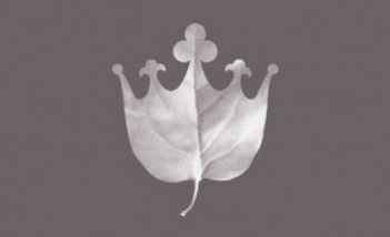 Logo Łazienek Królewskich przedstawiające liść zakończony na kształ korony.