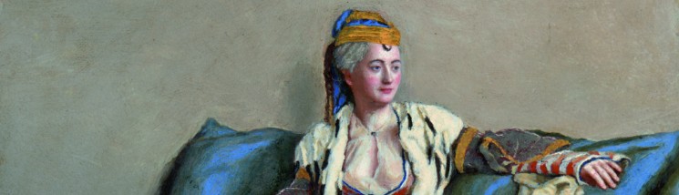 Obraz przedstawiający kobietę w ozdobnych szatach, w turbanie na głowie, siedzącą na kanapie. Kobieta w ręku trzyma wachlarz.